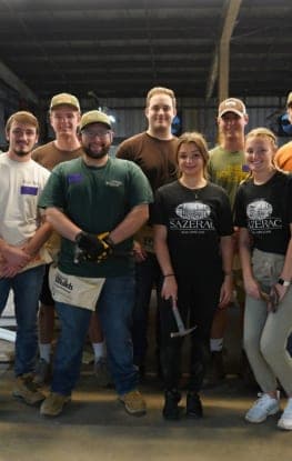 Members of the Sazerac team at a distillery