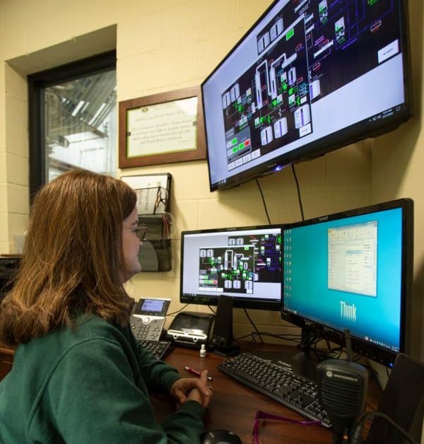Monitoring production at Glenmore Distillery, Owensboro, Kentucky
