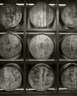 Download Black and white wall of Last Drop barrels