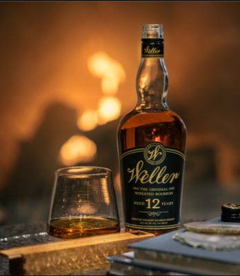 Download Neat pour of Weller and Weller bottle with fire in background