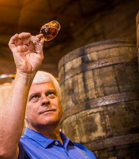 Distiller Checking Whiskey