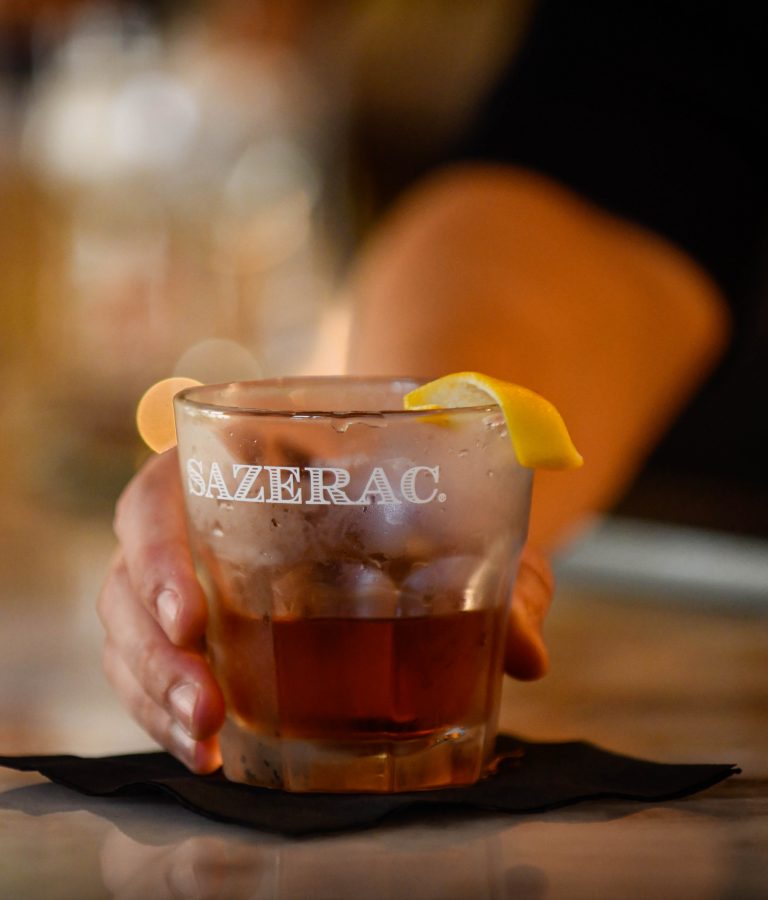 The Sazerac cocktail garnished with a lemon Peel