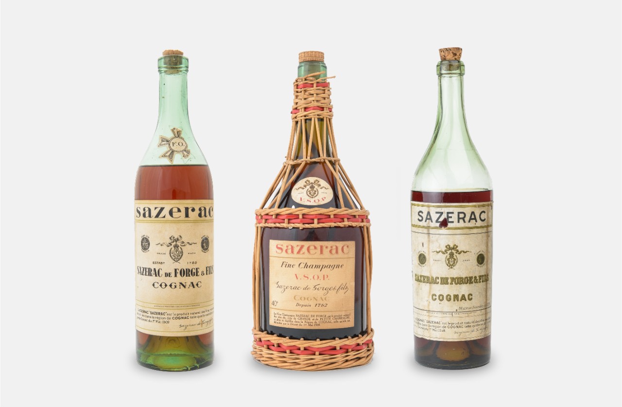 Three Vintage Sazerac de Forge Cognac Bottles