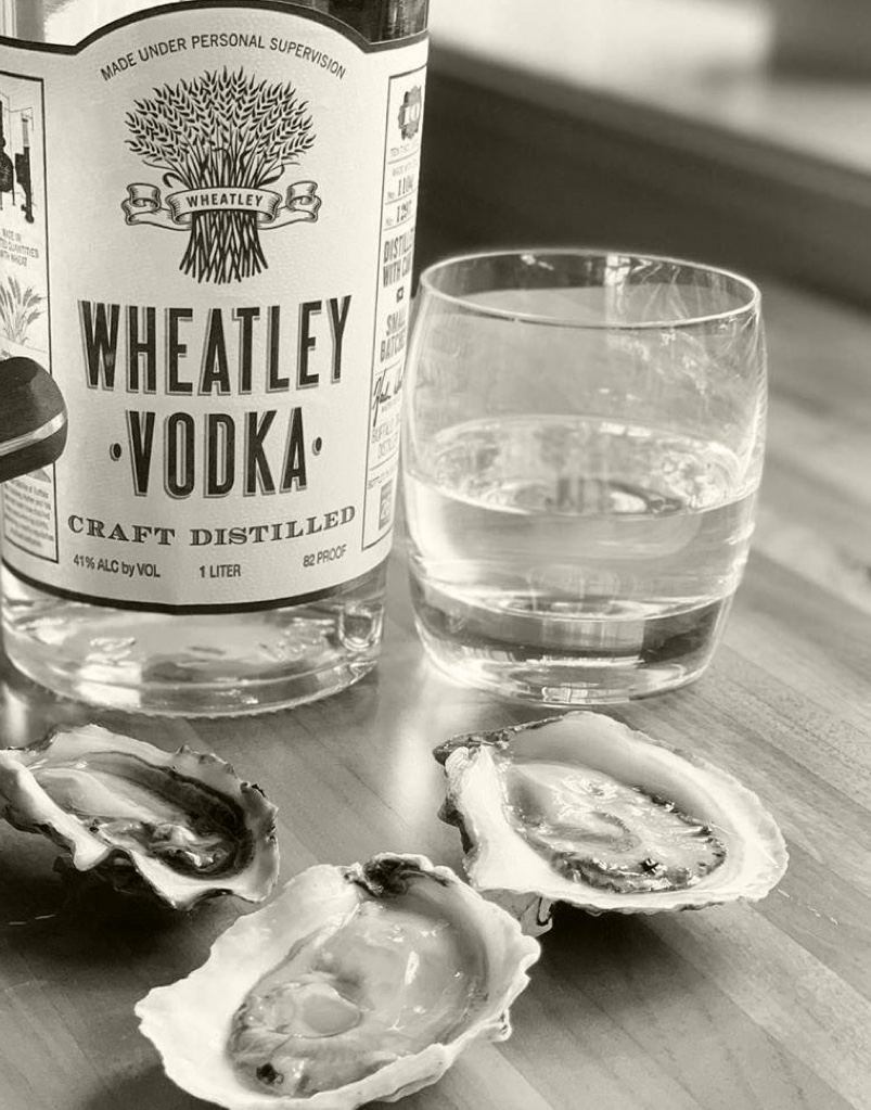 1 liter bottle of Wheatley Vodka paired with raw oysters