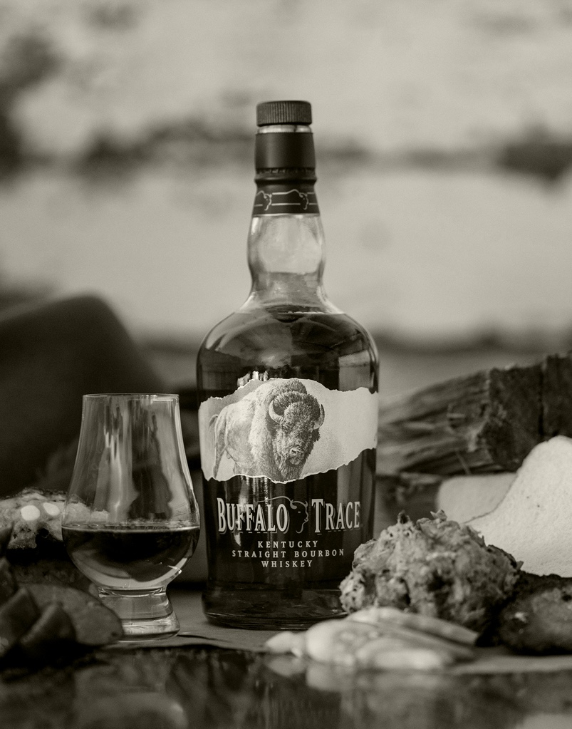 A black and white overlay of a glass of Buffalo Trace Kentucky Straight Bourbon Whiskey