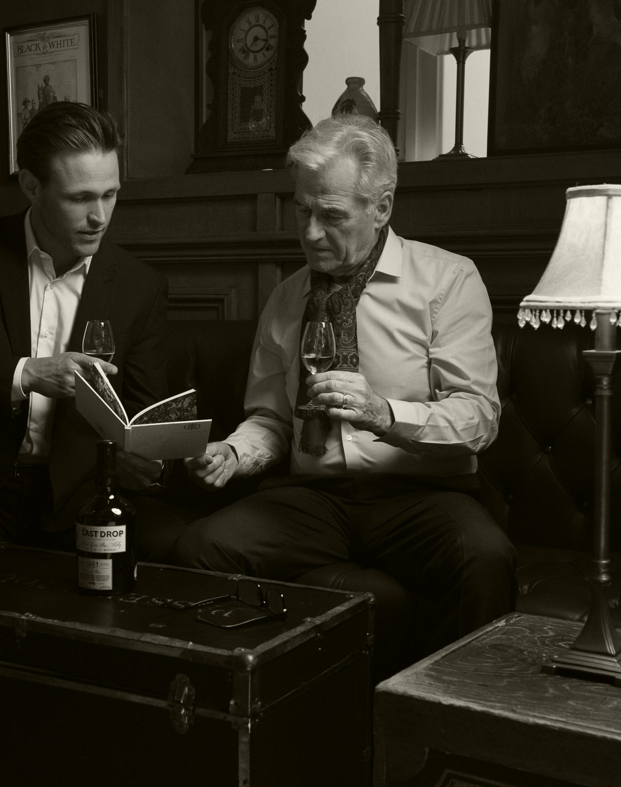 Black and white two men drinking Last Drop