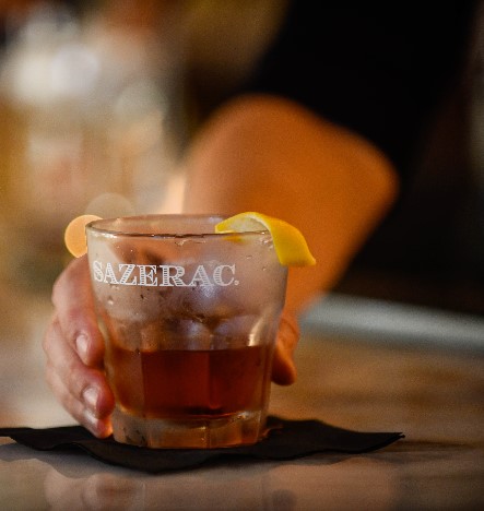 Sazerac Cocktail being served at a bar