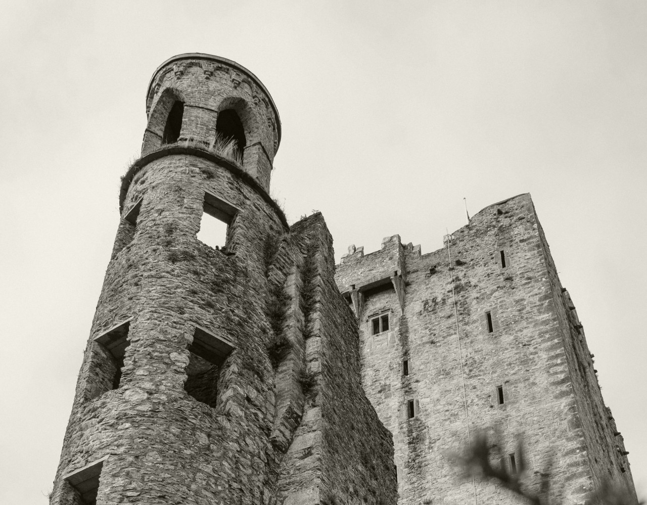 Black and white close up of tower of an Irish castle
