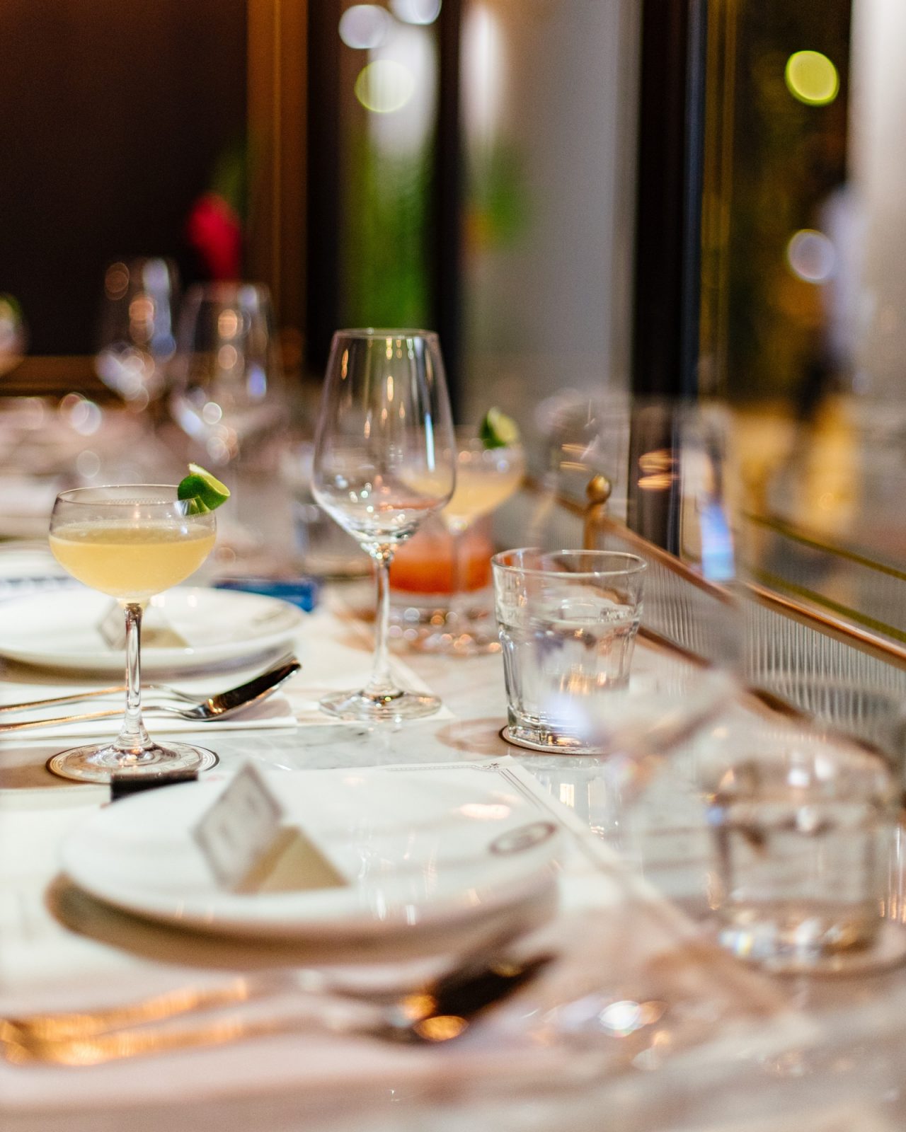 Formal table setting on white table cloth